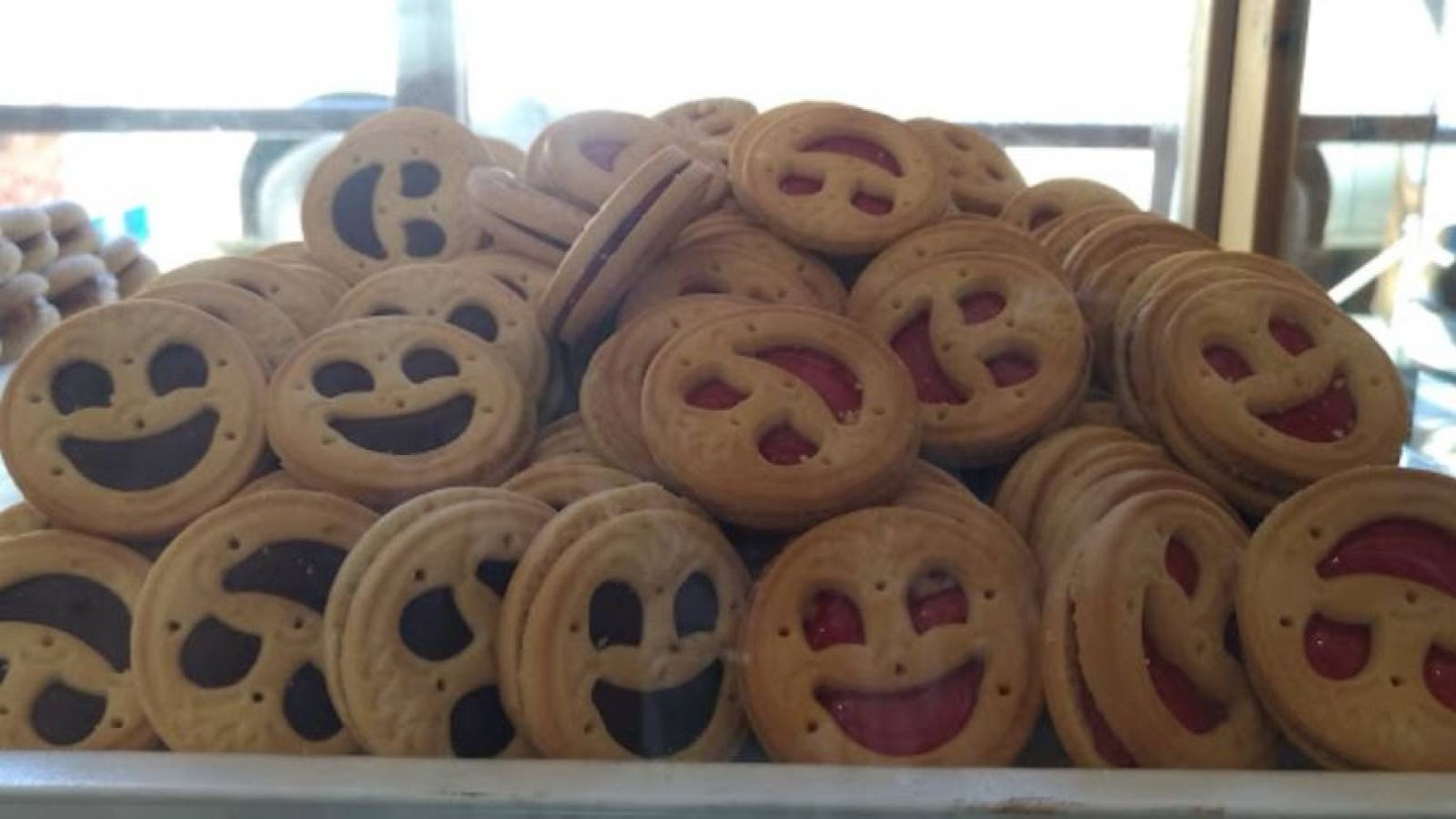Smiley-face biscuits behind the bakery counter